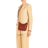 Il Bisonte Le Laudi Crossbody Bag in Seppia with adjustable strap and minimalist design.