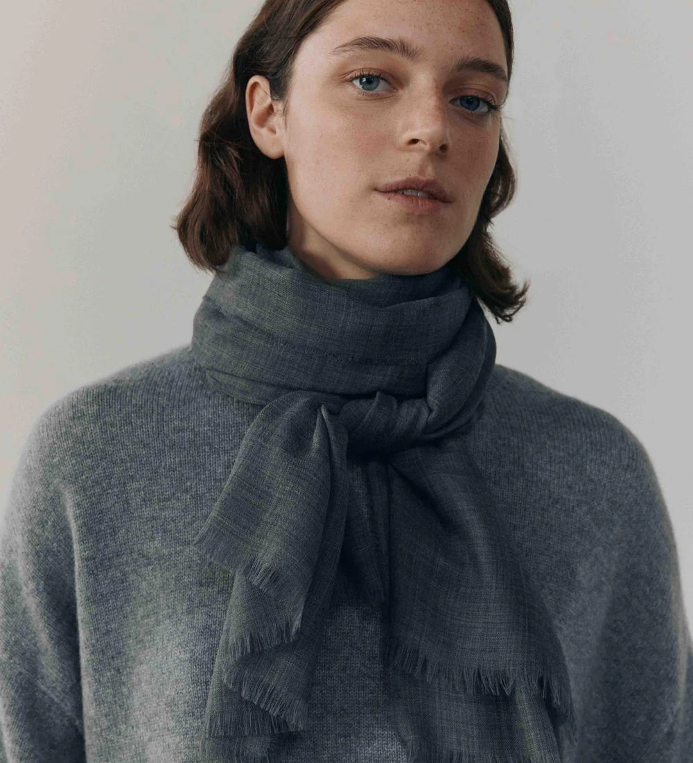 Close-up of Begg x Co Wispy Scarf showing airy cashmere texture and artisan craftsmanship.