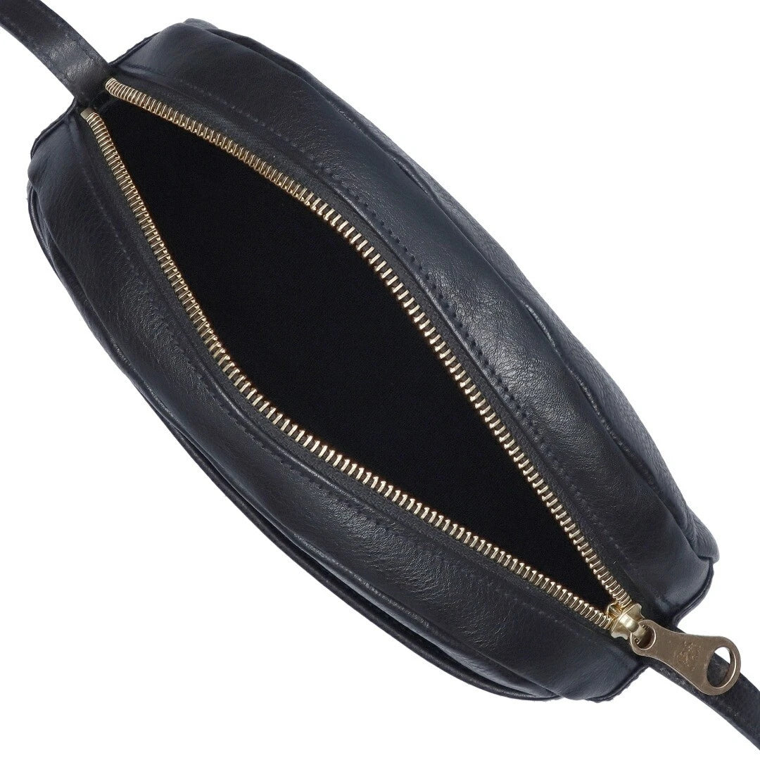 Close-up of Il Bisonte Nero crossbody bag showing fine grain and artisan detailing.