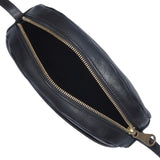 Close-up of Il Bisonte Nero crossbody bag showing fine grain and artisan detailing.