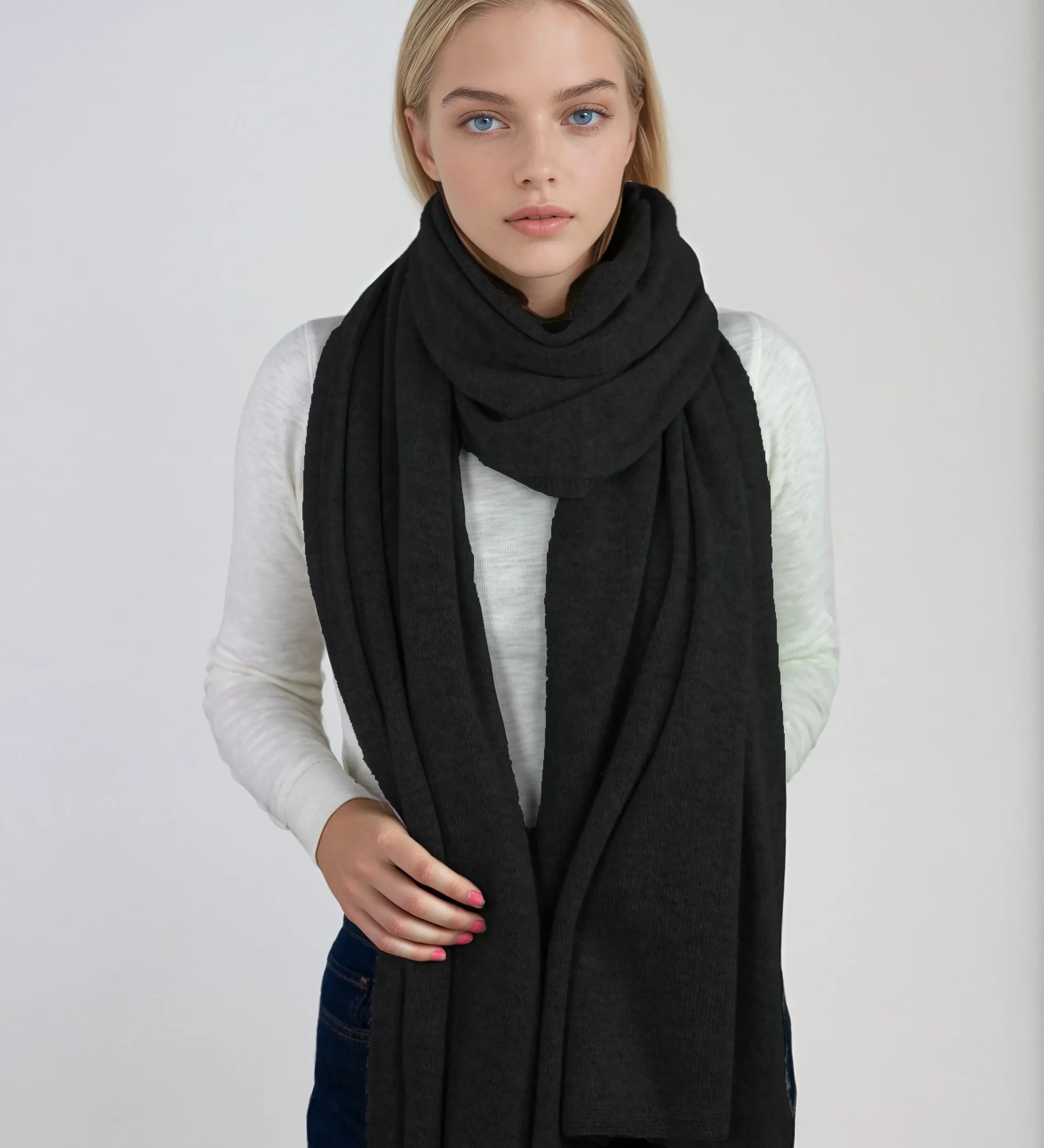 Oversized charcoal gray cashmere Scottish cashmere stole designed in Telluride and made in the USA. Ideal for travel, layering, or staying warm in style.
