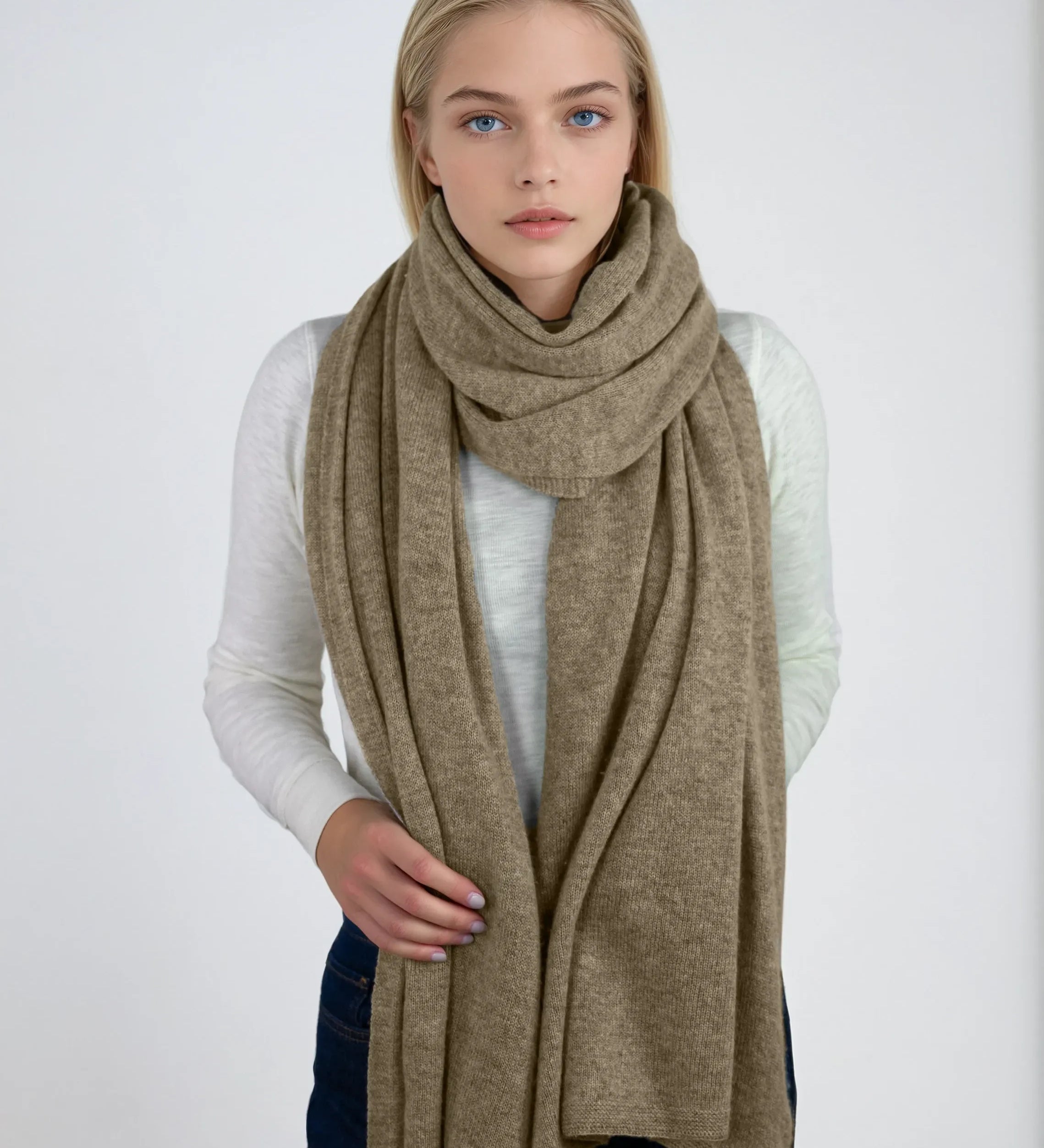 Oversized dark tan cashmere Scottish cashmere stole designed in Telluride and made in the USA. Ideal for travel, layering, or staying warm in style.