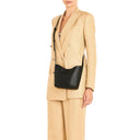 Il Bisonte Le Laudi Crossbody Bag in Nero with adjustable strap and minimalist silhouette.