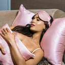 Soft silk eye mask by Branché in blush hue, promoting deep, restful sleep.