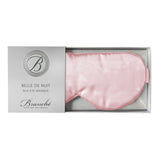 Blush pink silk eye mask by Branché, handcrafted for luxurious, restorative sleep.