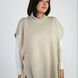 Ester poncho in haze – lightweight Scottish cashmere wrap with open sides, perfect for transitional layering in Telluride

