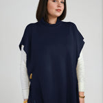 Ester poncho in navy – oversized cashmere layer with elegant open sides, designed for effortless styling in Telluride

