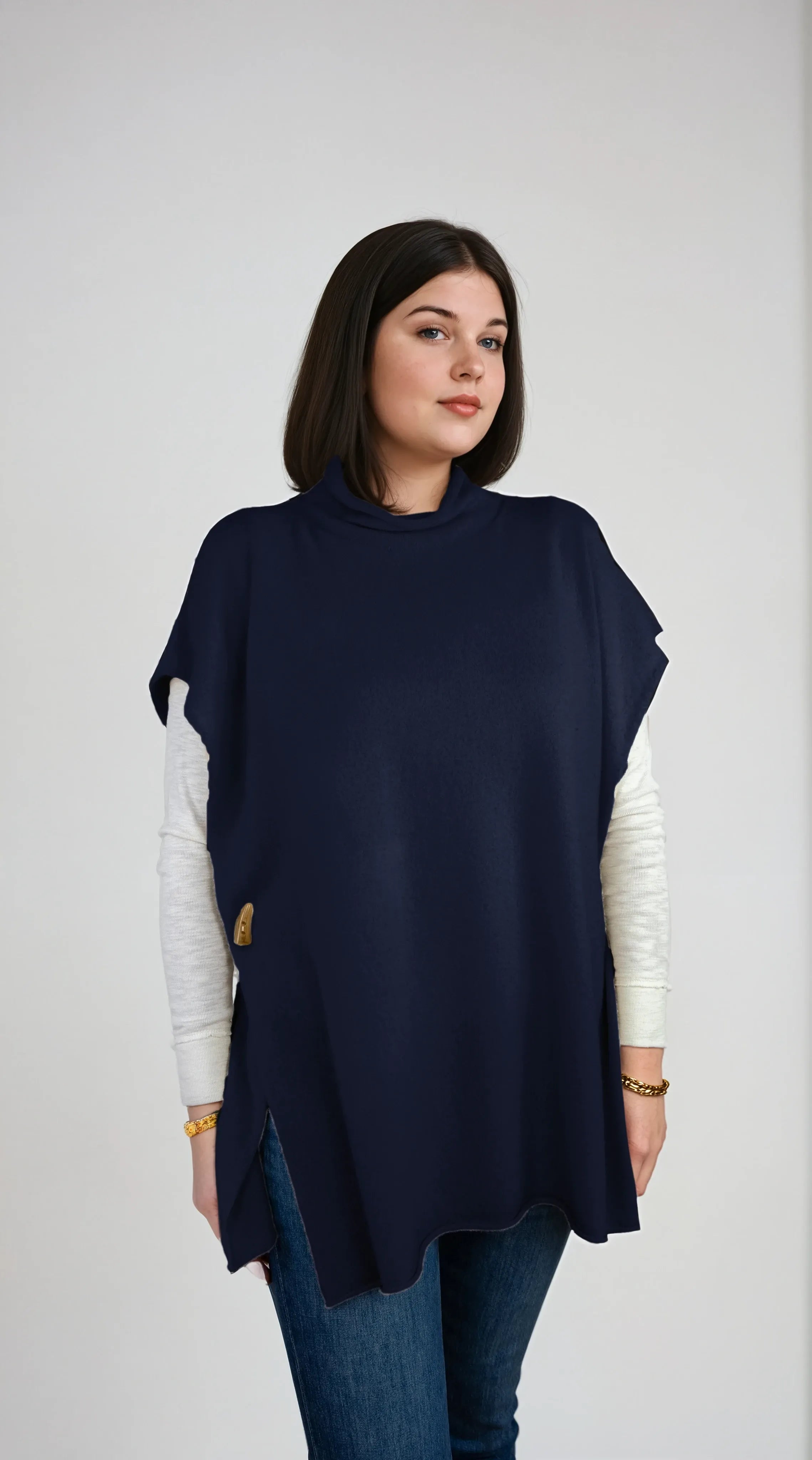 Ester poncho in navy – oversized cashmere layer with elegant open sides, designed for effortless styling in Telluride

