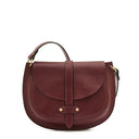 Side detail of the Il Bisonte Archivo Saddle Bag in Black Cherry showing magnetic closure, strap detail, and rich leather texture.