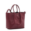 Front view of the Il Bisonte Nina Crossbody Bag in Black Cherry, handmade in Tuscany from vegetable-tanned cowhide with soft pleated details and adjustable strap.