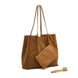 Front view of the Il Bisonte Nina Tote Bag in Gianduia suede, featuring hand-stitched pleats, vegetable-tanned leather handles, and a spacious Italian-made design.