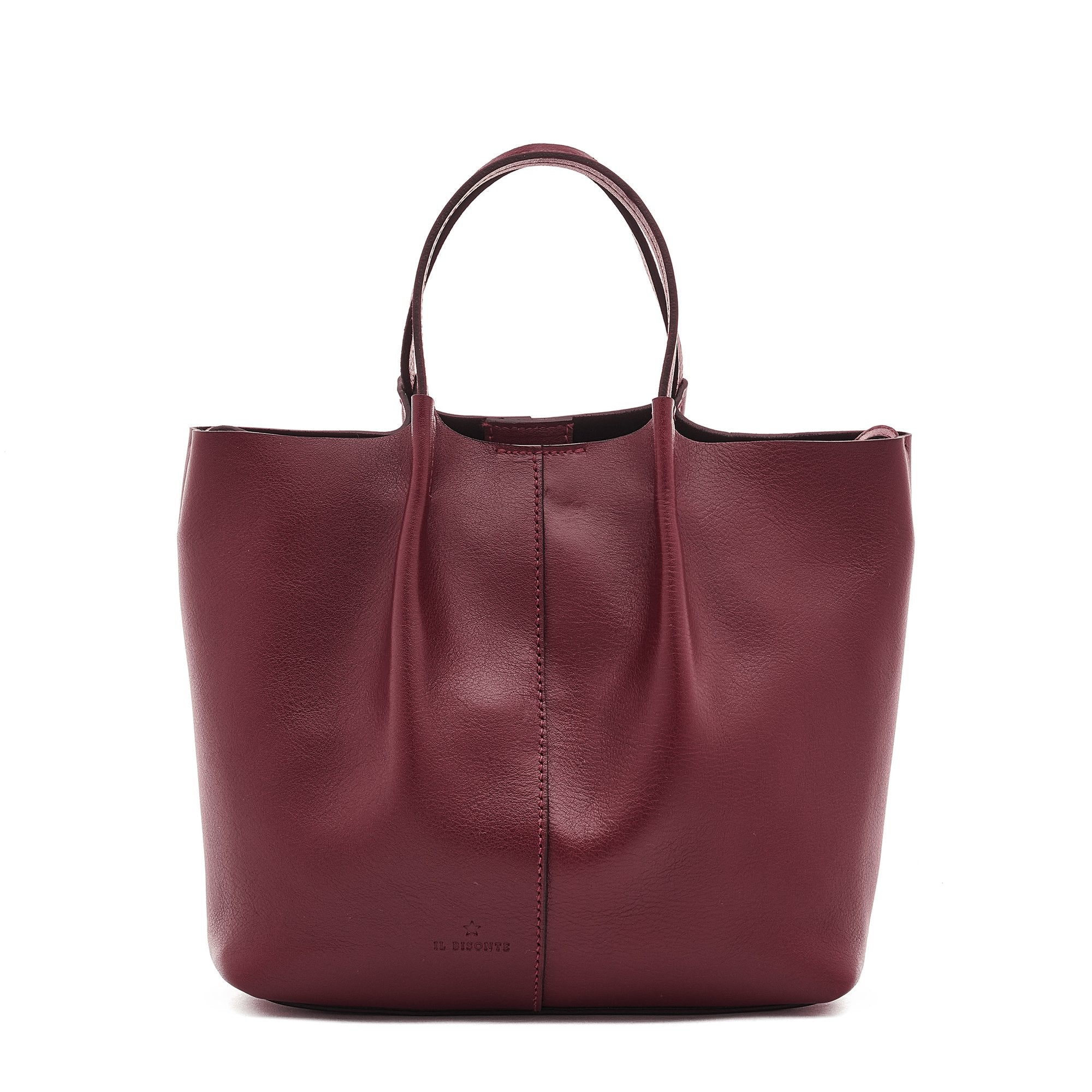 Maroon leather tote bag on a white background