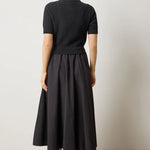 Back view of black mixed media dress – short sleeve knit sweater top and poplin skirt with clean silhouette, curated by CashmereRED Telluride

