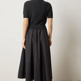 Back view of black mixed media dress – short sleeve knit sweater top and poplin skirt with clean silhouette, curated by CashmereRED Telluride

