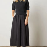 Mixed media dress in black – cotton knit sweater top with crisp black poplin skirt, one-piece styling from CashmereRED Telluride

