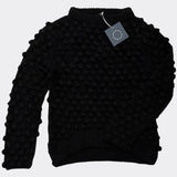 Front view of the Sphere One Buoy M5 sweater in Black, a hand-knit baby alpaca style with dramatic bobble texture and lightweight volume.