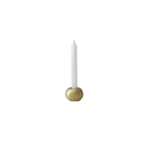 Brushed brass candle holder with modern circular design by Tina Frey, handcrafted in San Francisco.