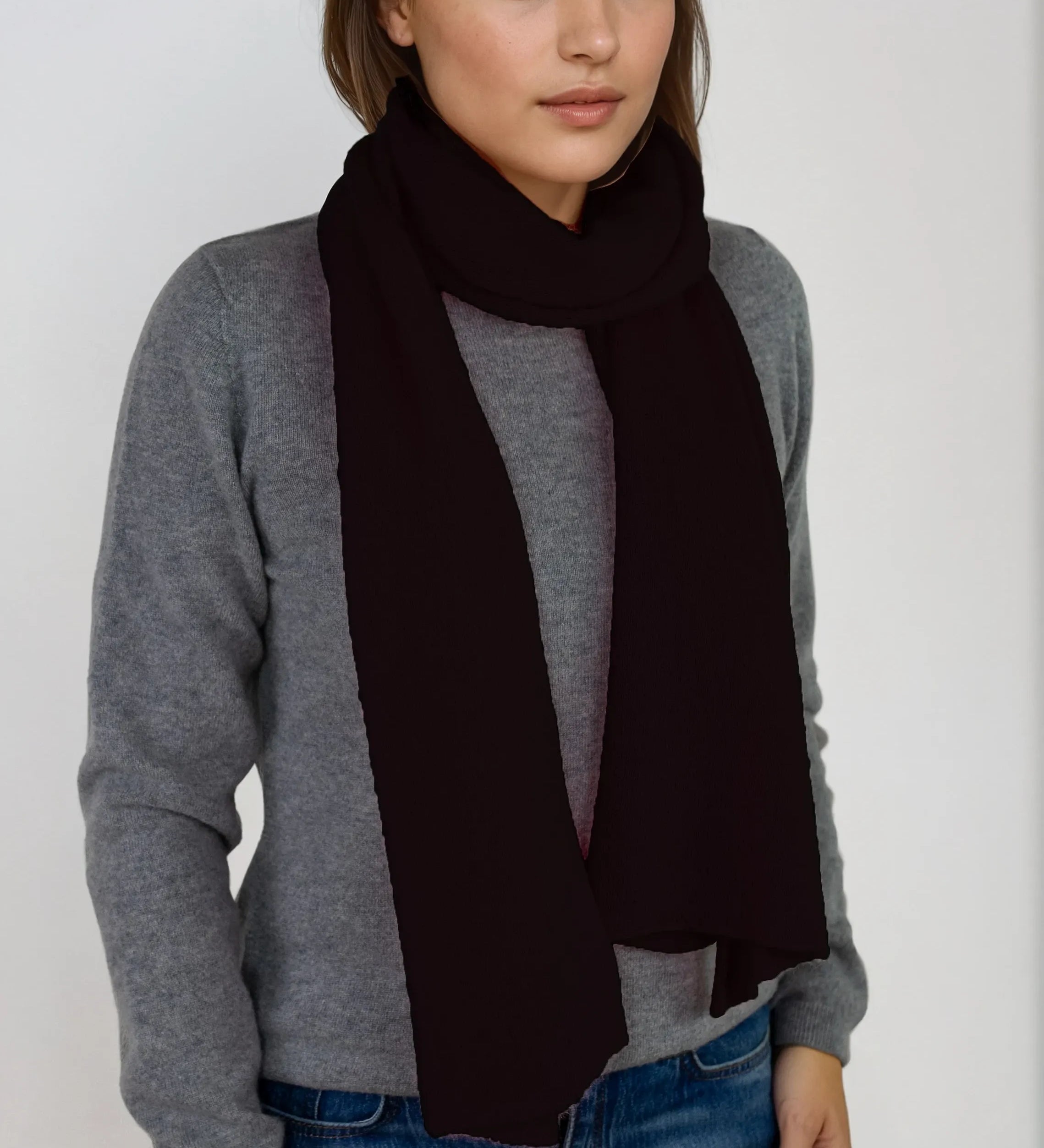 Lightweight deep black cashmere Scottish cashmere scarf designed in Telluride and made in the USA. A breathable, everyday accessory for understated luxury.