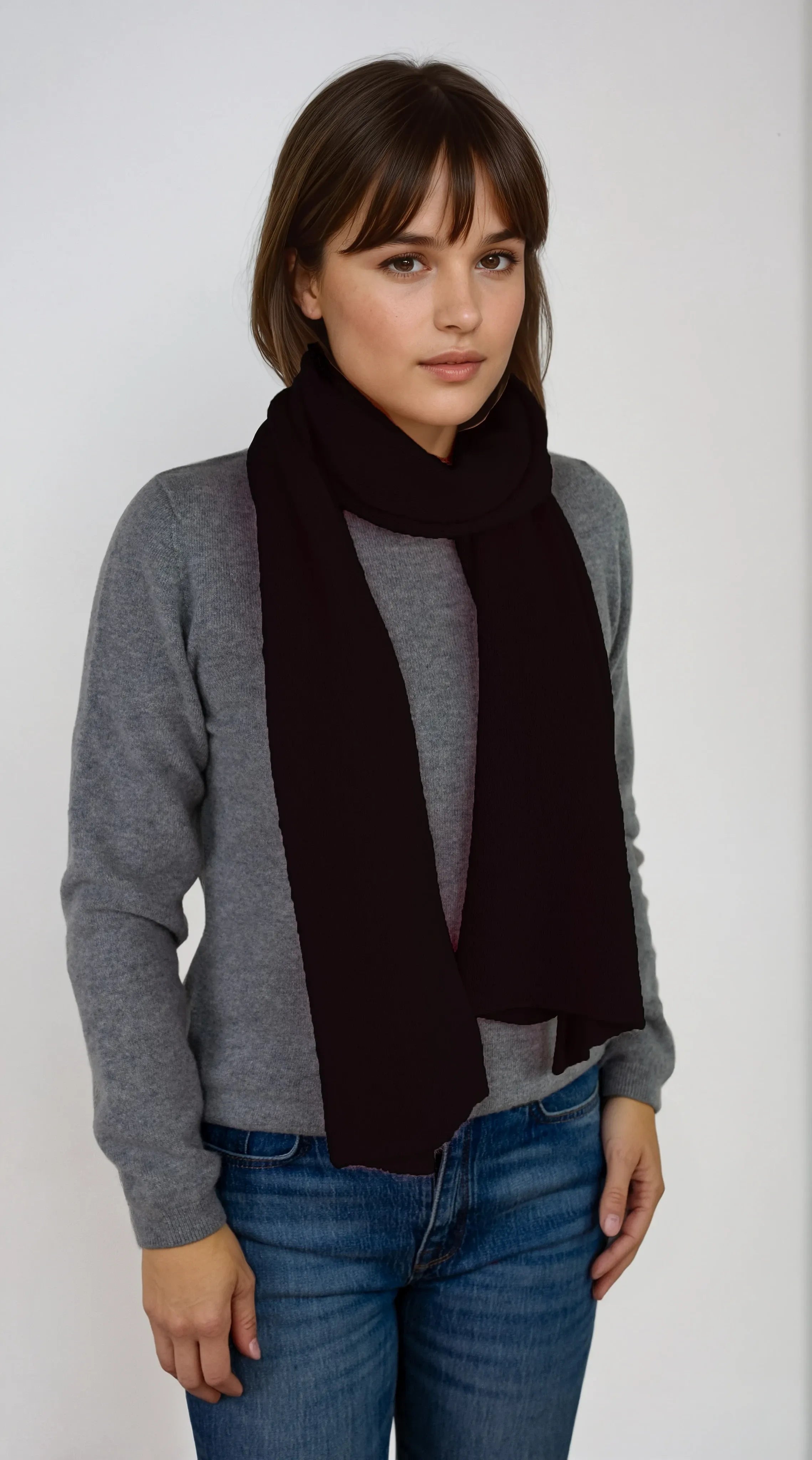 Lightweight deep black cashmere Scottish cashmere scarf designed in Telluride and made in the USA. A breathable, everyday accessory for understated luxury.