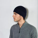 Ribbed cashmere beanie with extra crown room, designed in Telluride and made in the USA. A cozy unisex winter essential.