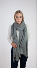 Oversized light gray cashmere Scottish cashmere stole designed in Telluride and made in the USA. Ideal for travel, layering, or staying warm in style.