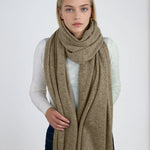 Oversized dark tan cashmere Scottish cashmere stole designed in Telluride and made in the USA. Ideal for travel, layering, or staying warm in style.