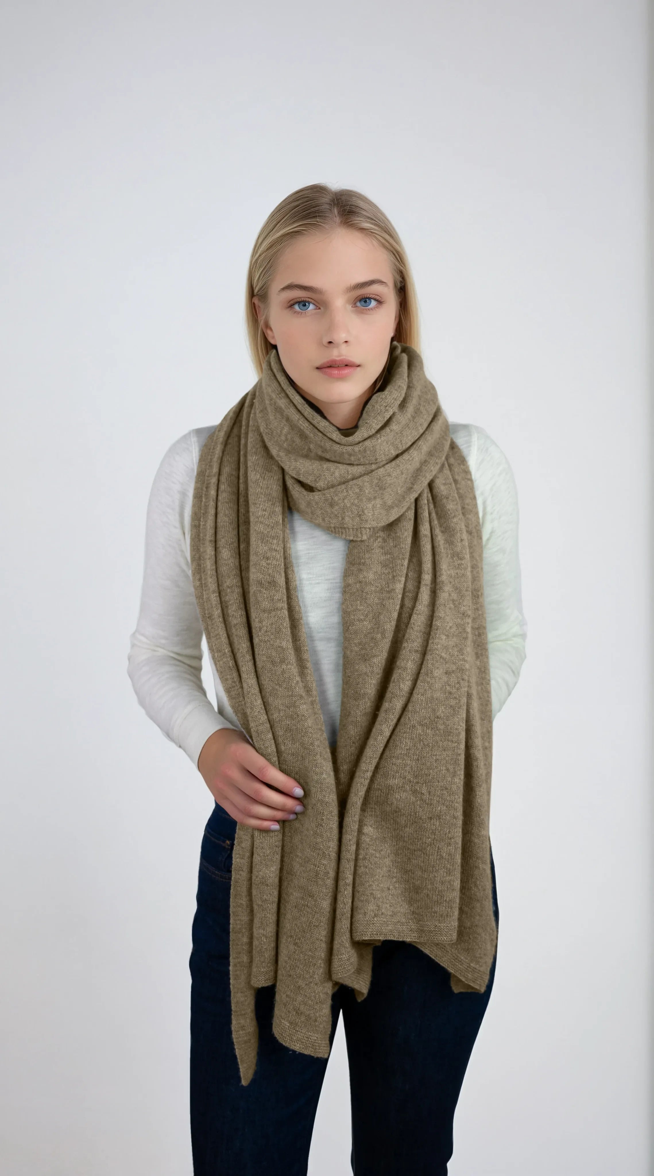 Oversized dark tan cashmere Scottish cashmere stole designed in Telluride and made in the USA. Ideal for travel, layering, or staying warm in style.