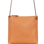 Women's leather crossbody pouch by B.May in tangerine pebbled leather with minimalist design
