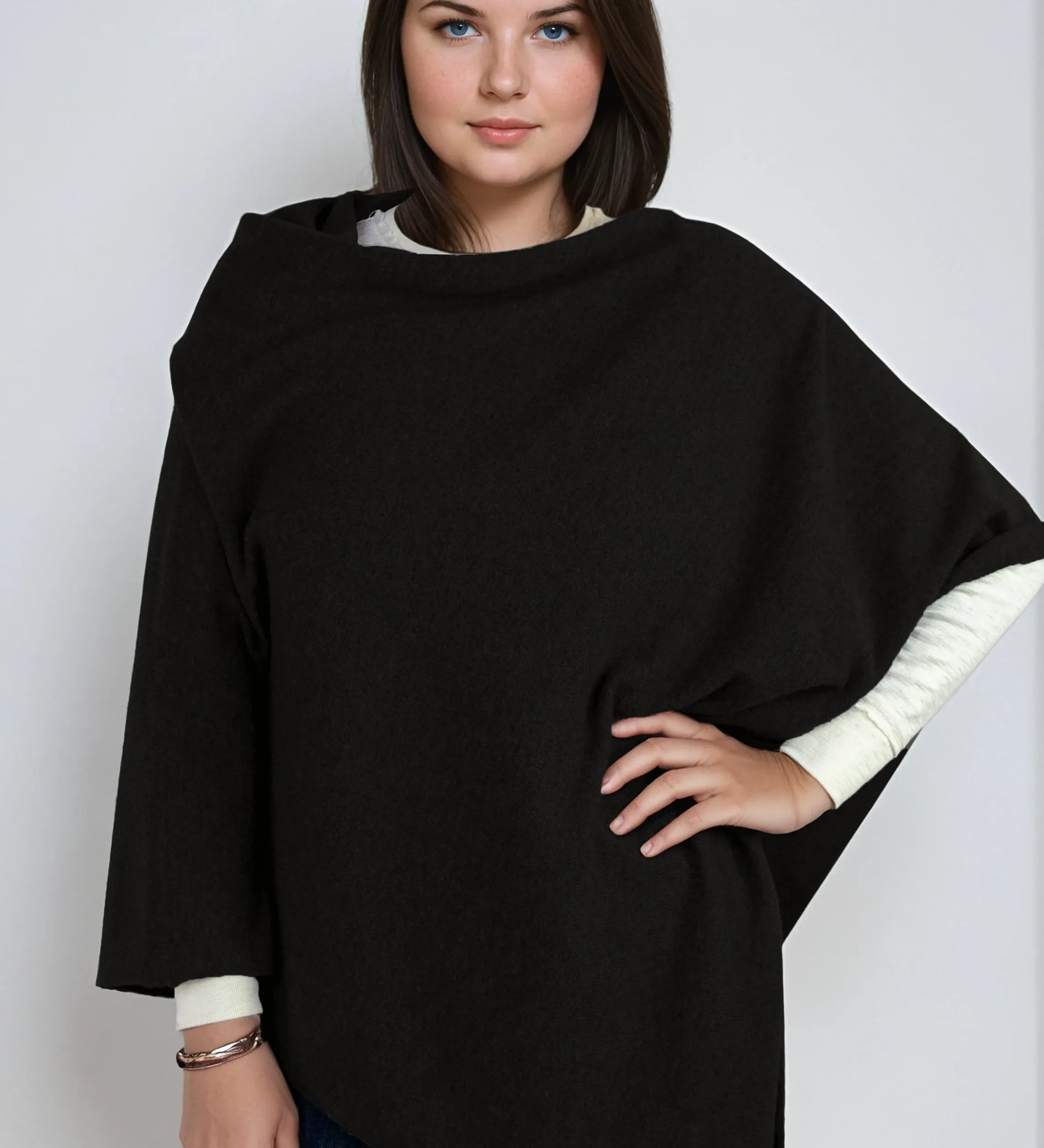 deep black cashmere Scottish cashmere poncho designed in Telluride and made in the USA. A versatile, elegant winter wrap for all body types.