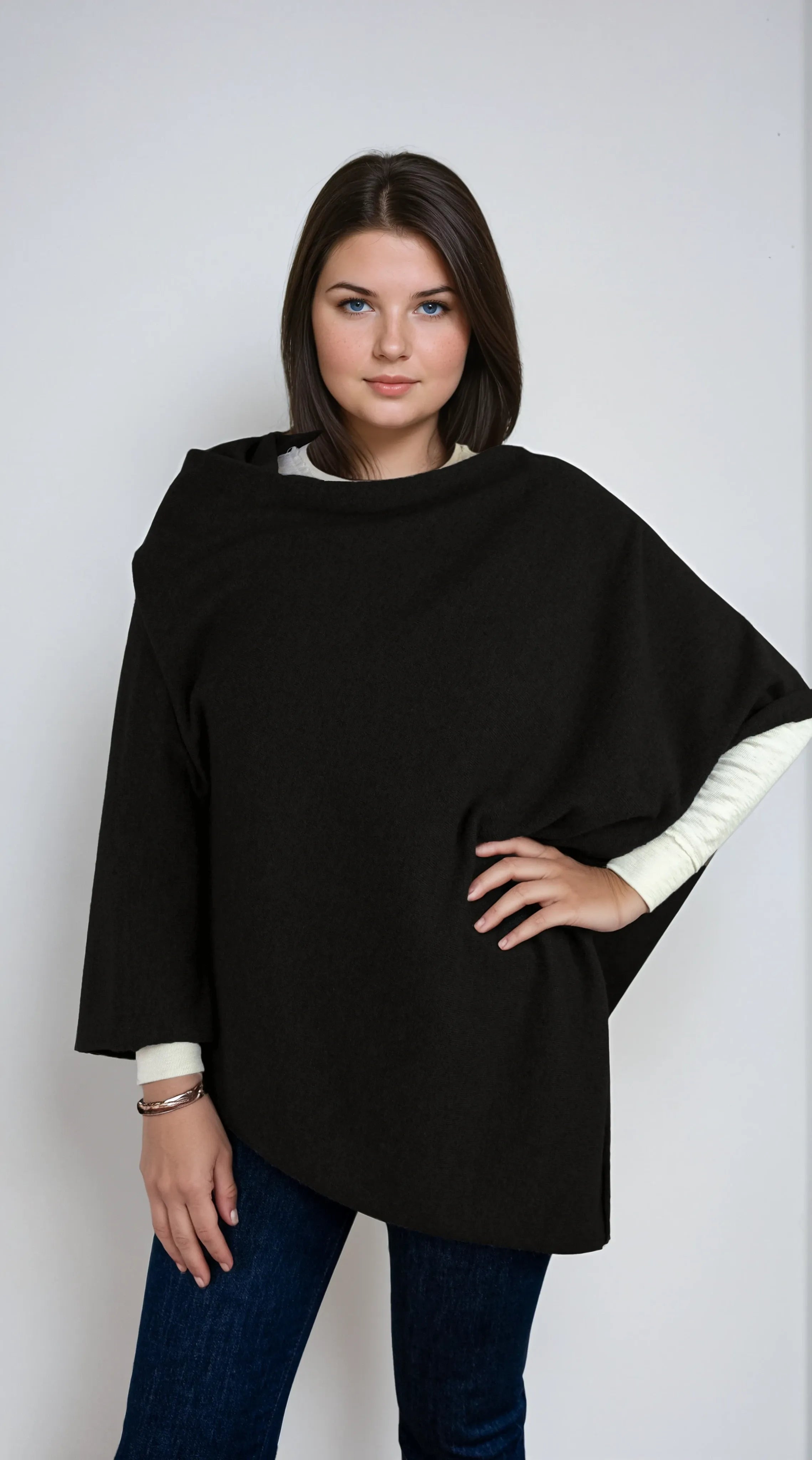 deep black cashmere Scottish cashmere poncho designed in Telluride and made in the USA. A versatile, elegant winter wrap for all body types.