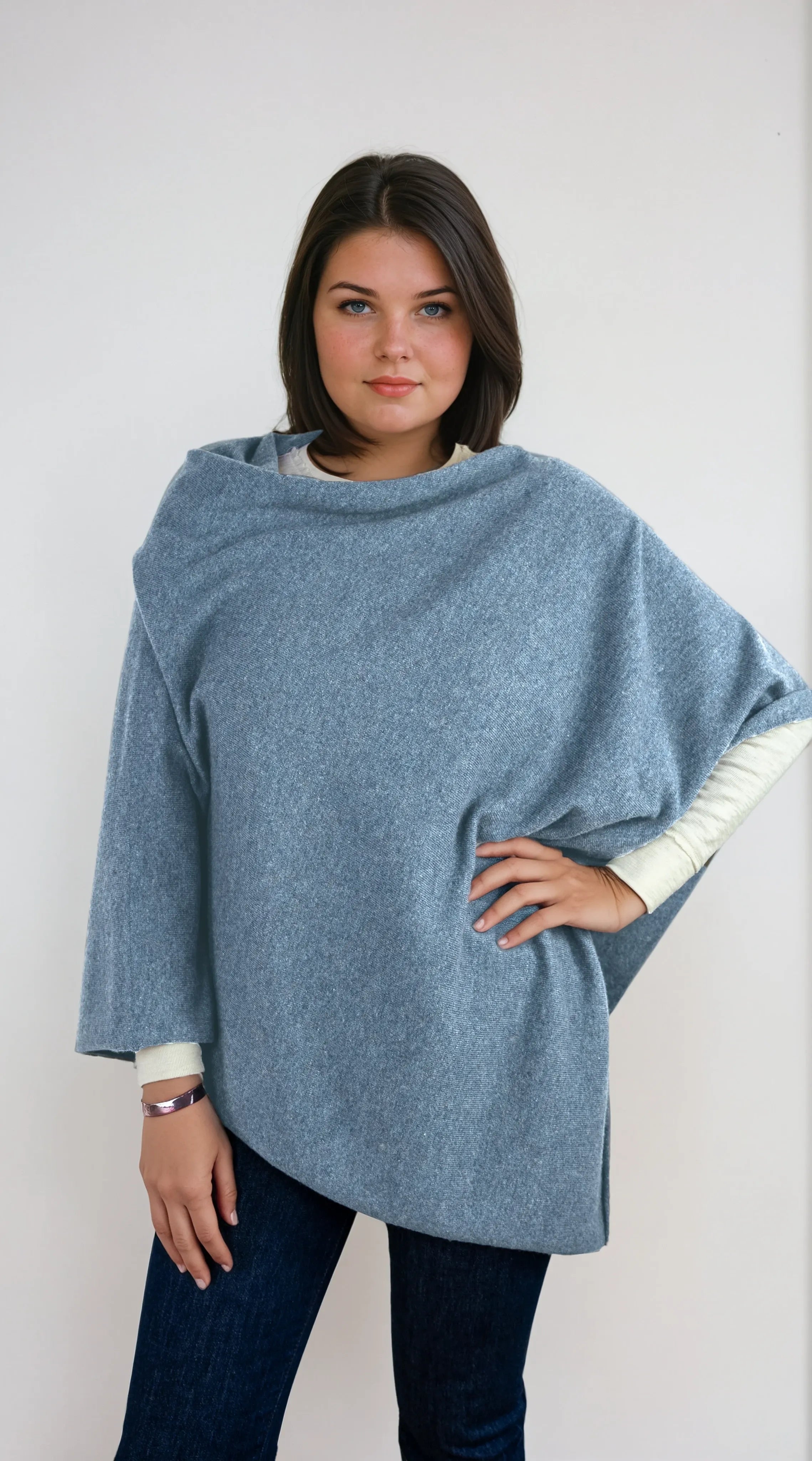 pale blue cashmere Scottish cashmere poncho designed in Telluride and made in the USA. A versatile, elegant winter wrap for all body types.