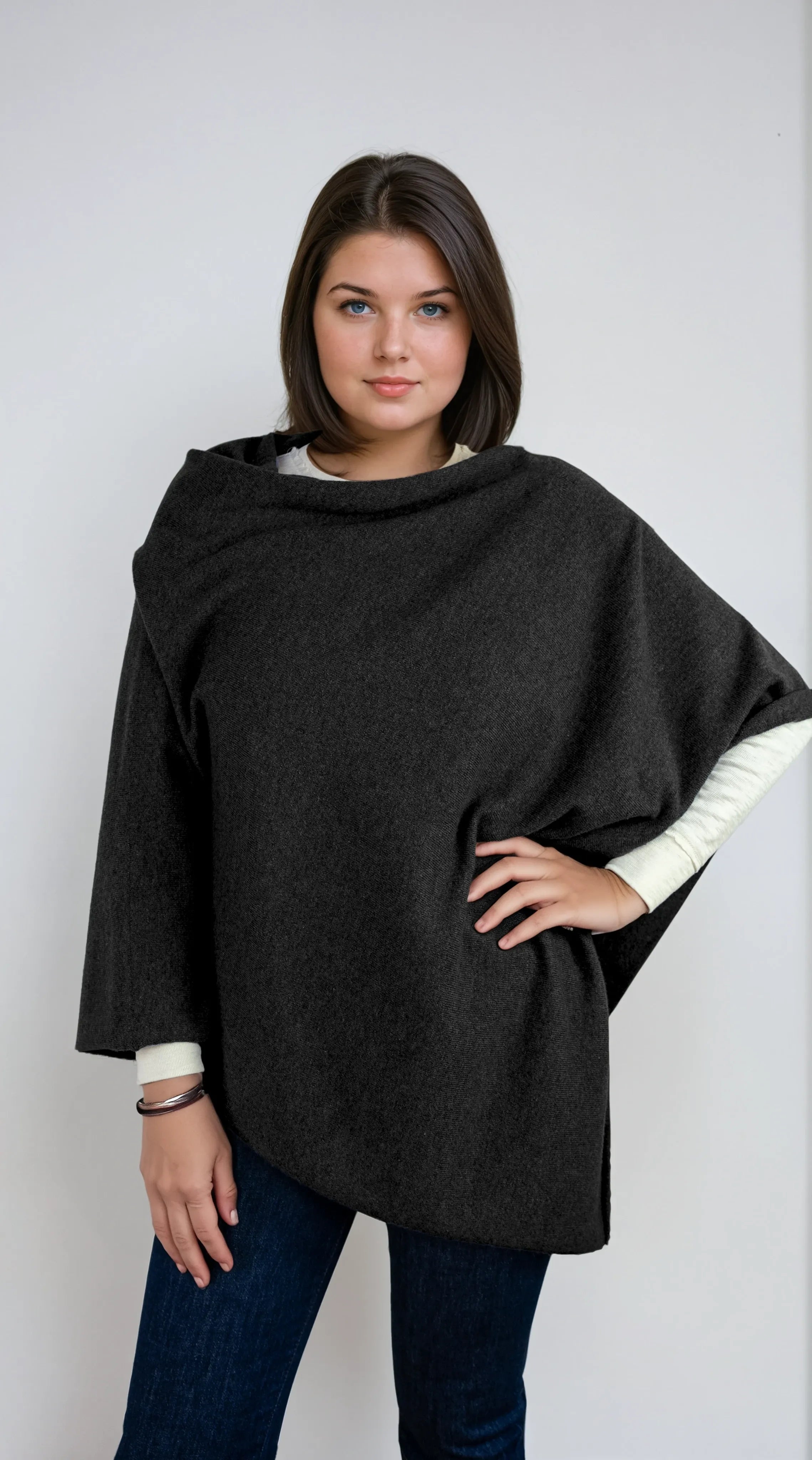 charcoal gray cashmere Scottish cashmere poncho designed in Telluride and made in the USA. A versatile, elegant winter wrap for all body types.