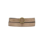 Close-up of Il Bisonte Bigallo belt showing round logo-engraved buckle in polished metal