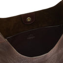 Close-up of vegetable-tanned leather craftsmanship on Il Bisonte Le Laudi shoulder bag