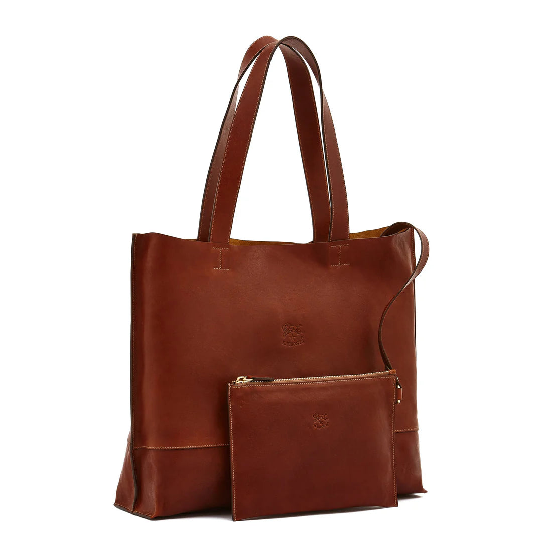 Close-up of vegetable-tanned Tuscan leather craftsmanship on Il Bisonte Talamone tote bag