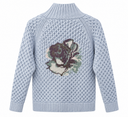 Back of the Lamberto Losani cashmere Aran turtleneck with a plum and sage rose motif