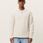 Men's long sleeve knit polo by Les Deux in cotton weave knit with button placket and ribbed collar