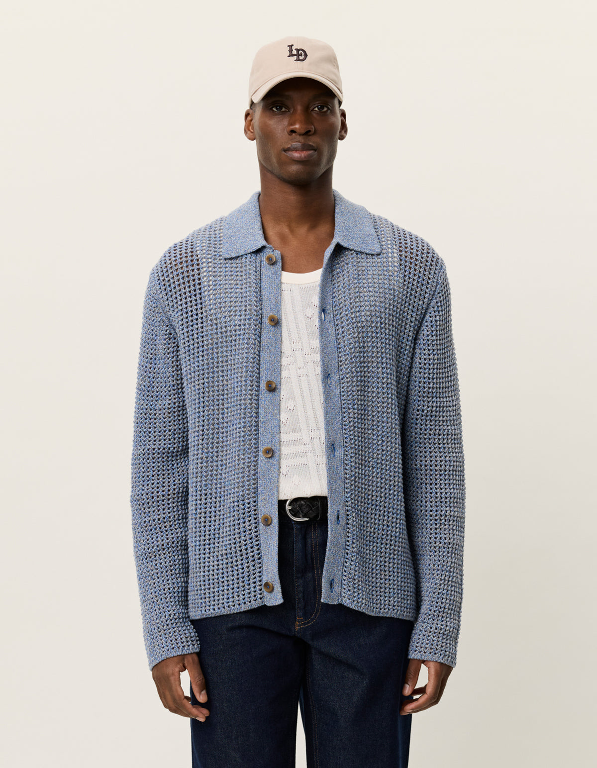 Men's long sleeve lace knit shirt by Les Deux in dark denim blue with button front and textured cotton knit
