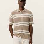 Men's striped knitted short sleeve shirt by Les Deux featuring a collared neckline and button front in a breathable cotton blend