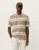 Men's striped knitted short sleeve shirt by Les Deux featuring a collared neckline and button front in a breathable cotton blend
