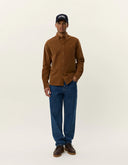 Model wearing Les Deux Konrad Corduroy Shirt in fine organic cotton corduroy, styled as lightweight everyday menswear