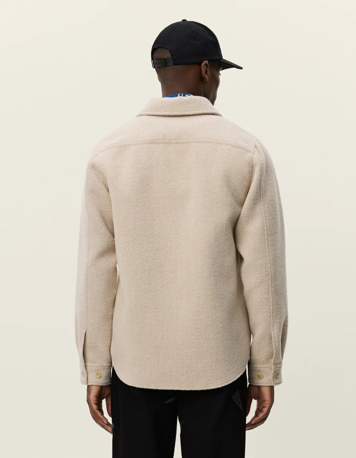 Back view of Les Deux Lennon Bouclé Overshirt in heavyweight recycled polyester and wool blend with curved hem