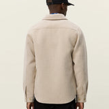 Back view of Les Deux Lennon Bouclé Overshirt in heavyweight recycled polyester and wool blend with curved hem