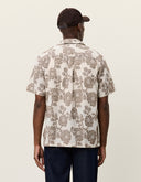 Back view of men's floral jacquard shirt by Les Deux with lightweight cotton fabric and loose fit