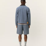 Back view of men's striped denim jacket by Les Deux with regular fit and structured fabric