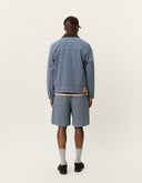 Back view of men's striped denim jacket by Les Deux with regular fit and structured fabric