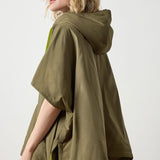 Close-up of knit texture on Lilla P Hooded Poncho in evergreen, women’s hooded layering piece