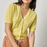 Women's lightweight cotton cardigan by Lilla P in lemon with open stitch knit and V-neck