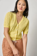 Women's lightweight cotton cardigan by Lilla P in lemon with open stitch knit and V-neck
