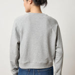 Back view of Lilla P Raglan Sweatshirt in French Terry 100% cotton, shorter length with relaxed fit, neutral tone